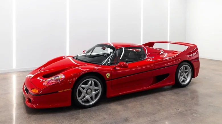 Check out the cool Ferrari F50 35 year old car, beautiful car like new pictures 1