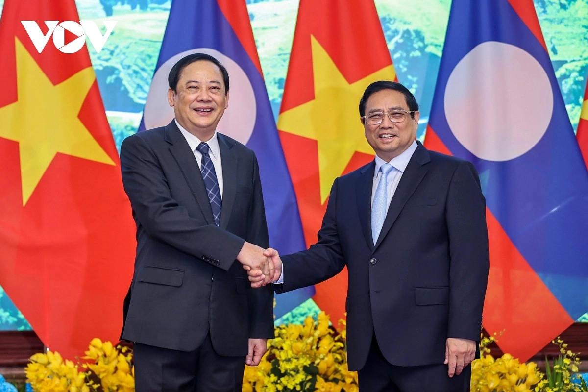 lao pm sonexay siphandone warmly welcomed in hanoi on official visit picture 6