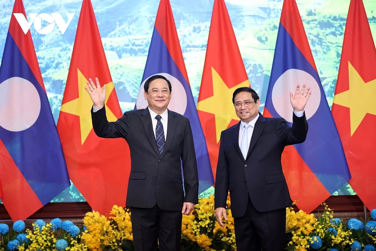 lao pm sonexay siphandone warmly welcomed in hanoi on official visit picture 7