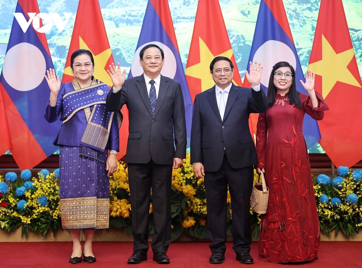 lao pm sonexay siphandone warmly welcomed in hanoi on official visit picture 8